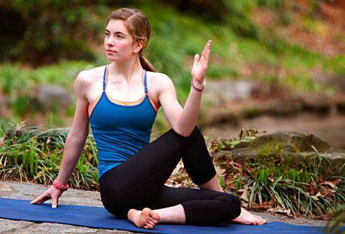 DailyMedicalinfo4 photo of teen girl in seated twist pose1